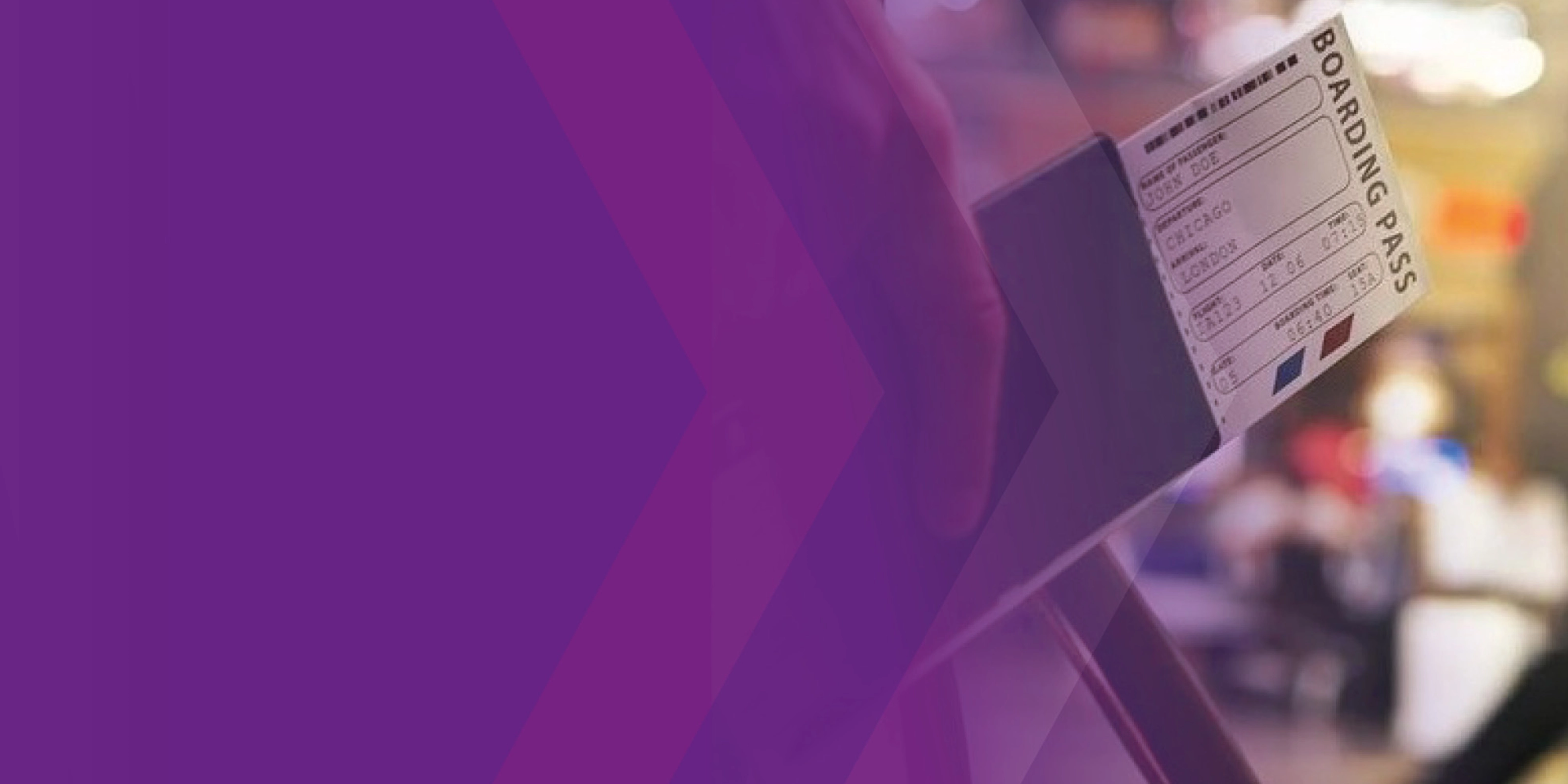 Close-up of a ticket being held at a counter, partly covered by a purple overlay.